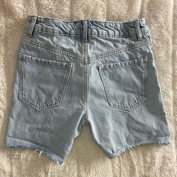 Long & high waisted light washed button up Jean shorts - Picture 2 of 5